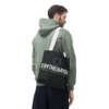 Person_4-removebg-preview Hombre llevando tote bag Erytheia4You